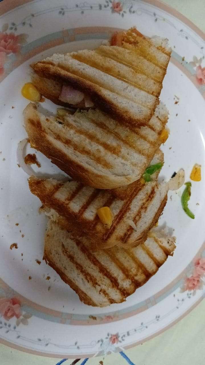 Veg Grilled Sandwich with stuffed filling of paneer and corn - Image 1